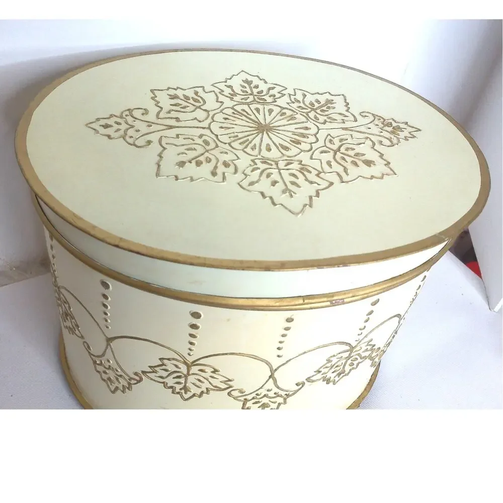 Vtg Ornate Embossed Metal Round Box Gold Cream Floral Footed Hollywood Regency